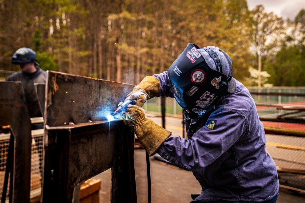 man welding
