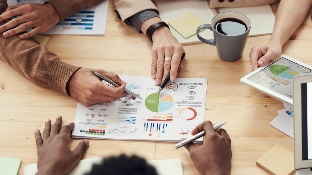 people in planning meeting image