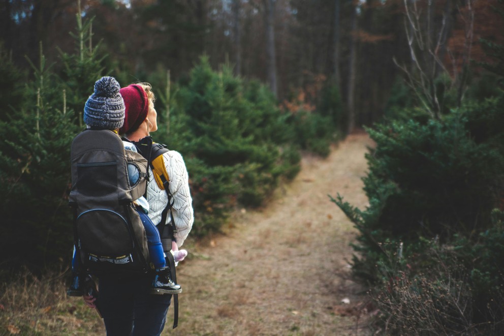 woman hiking with child